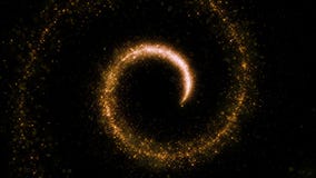 Gold glittering star dust magic spiral of trail sparkling particles on black.