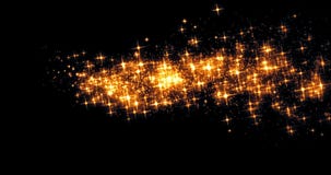 Gold glow glittering stars bokeh tail transition sparkle effect on black background, holiday happy new year