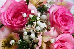 Gold Wedding Rings On A Flower Background Stock Images Gold Wedding Rings On A Flower Background Stock Images