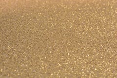Golden glittering background as a template stock images Golden glittering background as a template stock images