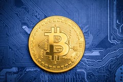 Golden bitcoin on printed circuit board Royalty Free Stock Photos Golden bitcoin on printed circuit board Royalty Free Stock Photos