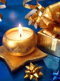 Golden Candle And Gift Box Stock Photography