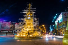 Golden Clock Tower , Built In Typical Thai Style Is Architecture Symbol Of Chiang Rai City In Night Time. Stock Photo Golden Clock Tower , Built In Typical Thai Style Is Architecture Symbol Of Chiang Rai City In Night Time. Stock Photo