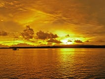 Golden coastal cloudy sunrise seascape stock image Golden coastal cloudy sunrise seascape stock image