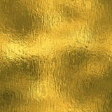 Golden Foil Seamless and Tileable luxury background texture. Glittering holiday wrinkled gold background.