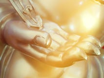 Golden hand of buddha statue stock photos Golden hand of buddha statue stock photos