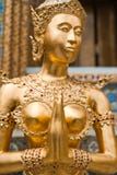 Golden Kinnari statue at Temple of Emerald Buddha. Bangkok, Thailand royalty free stock images Golden Kinnari statue at Temple of Emerald Buddha. Bangkok, Thailand royalty free stock images