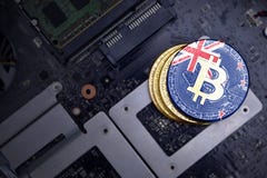Golden Bitcoins With Flag Of New Zealand On A Computer Electronic - 