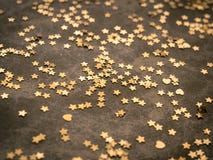 Golden stars on dark brown background Stock Photography Golden stars on dark brown background Stock Photography