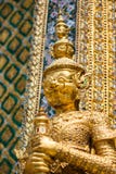Golden statue at the Wat Phra Kaew Palace, also known as the Emerald Buddha Temple. Bangkok, Thailand. royalty free stock images Golden statue at the Wat Phra Kaew Palace, also known as the Emerald Buddha Temple. Bangkok, Thailand. royalty free stock images