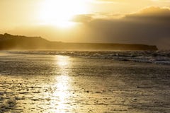 Golden sunset at the beach stock images Golden sunset at the beach stock images