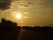 Golden Sunset with a Highway Reflection royalty free stock photos Golden Sunset with a Highway Reflection royalty free stock photos