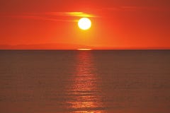 Golden sunset over water