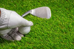 Pick up golf ball on grass royalty free stock photo Pick up golf ball on grass royalty free stock photo