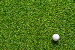 Golf ball on green grass texture of golf course for background. stock photo Golf ball on green grass texture of golf course for background. stock photo