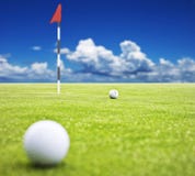 Golf Ball On A Putting Green Stock Images