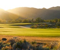 Golf Course At Sunset Stock Image