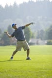Golfer Throwing Club - vertical