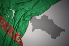 Golvende kleurrijke nationale vlag en kaart van turkmenistan royalty-vrije stock afbeelding Golvende kleurrijke nationale vlag en kaart van turkmenistan royalty-vrije stock afbeelding