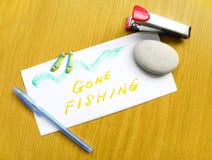 Gone Fishing Note On Desk Stock Photo Gone Fishing Note On Desk Stock Photo