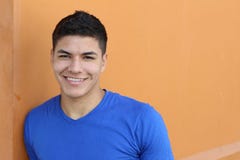 Good looking ethnic young male smiling with copy space stock photography Good looking ethnic young male smiling with copy space stock photography