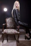 Gorgeous Blonde Sitting On A Vintage Chair Royalty Free Stock Image
