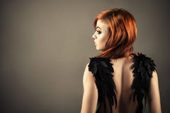 Gorgeous Redhead Woman With Black Wings Royalty Free Stock Photos Gorgeous Redhead Woman With Black Wings Royalty Free Stock Photos
