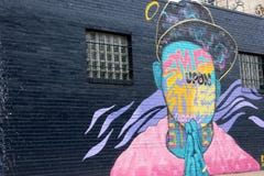 Gorgeous street art scene on black brick wall of building, downtown Austin, Texas, 2018 royalty free stock images Gorgeous street art scene on black brick wall of building, downtown Austin, Texas, 2018 royalty free stock images