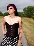 Gothic Girl With Hand On Hip Royalty Free Stock Images