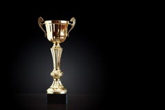 Gouden Trofee op Zwarte royalty-vrije stock foto Gouden Trofee op Zwarte royalty-vrije stock foto