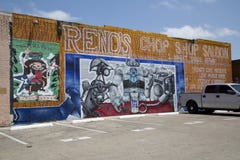 Graffiti sur le mur de briques du parking images stock Graffiti sur le mur de briques du parking images stock