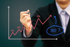 Grafico di stima di scrittura dell'uomo d'affari per gli anni 2017 & x28; Tone& pastello x29; Immagini Stock Libere da Diritti Grafico di stima di scrittura dell'uomo d'affari per gli anni 2017 & x28; Tone& pastello x29; Immagini Stock Libere da Diritti