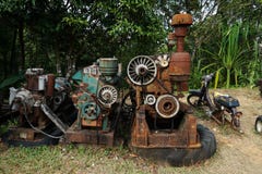 Grain Image: Close up of old machine factory made of steel and used in the past. Broken and rustic machine left over in abandon fa royalty free stock image Grain Image: Close up of old machine factory made of steel and used in the past. Broken and rustic machine left over in abandon fa royalty free stock image