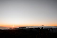GRAN CANARIA, SPAIN - NOVEMBER 6, 2018: Morning landscape of Roque Nublo mountain with a view of beautiful Tenerife stock photos GRAN CANARIA, SPAIN - NOVEMBER 6, 2018: Morning landscape of Roque Nublo mountain with a view of beautiful Tenerife stock photos