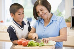 Grandmother And Grandson Preparing meal Royalty Free Stock Photo Grandmother And Grandson Preparing meal Royalty Free Stock Photo