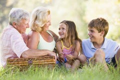 Grandparents having a picnic with grandchildren