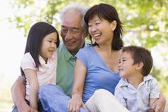 Grandparents laughing with grandchildren royalty free stock photo Grandparents laughing with grandchildren royalty free stock photo