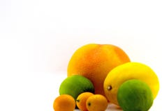 Grapefrukt citron, limefrukt, kumquat royaltyfri bild Grapefrukt citron, limefrukt, kumquat royaltyfri bild