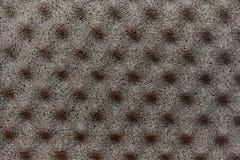Gray background of foam material with pyramidal protrusions on t stock photo Gray background of foam material with pyramidal protrusions on t stock photo