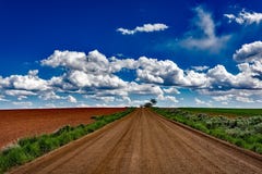 Gray Soil Road Near Field during Daytime Photo Stock Photography Gray Soil Road Near Field during Daytime Photo Stock Photography