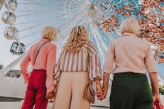 Beautiful light photo of three stylish grannies stock image Beautiful light photo of three stylish grannies stock image
