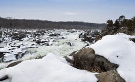 Great Falls Waterfall in the Winter with Snow Covered Rocks royalty free stock images Great Falls Waterfall in the Winter with Snow Covered Rocks royalty free stock images