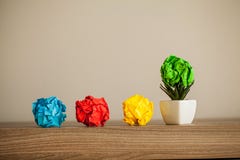Great idea concept. Crumpled colorful paper on wooden table. Copy space stock photos Great idea concept. Crumpled colorful paper on wooden table. Copy space stock photos