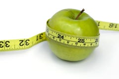 Green Apple With Tape Line Stock Photo