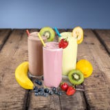 Colorful healthy milkshakes isolated on stock images Colorful healthy milkshakes isolated on stock images