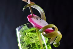 Green dragon fruit cocktail and lemon stock photo Green dragon fruit cocktail and lemon stock photo