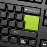 Green enter button in black keyboard Stock Image Green enter button in black keyboard Stock Image