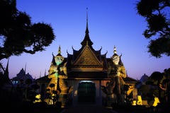 The Green Giant and White Giant at Wat Arun stock photo The Green Giant and White Giant at Wat Arun stock photo