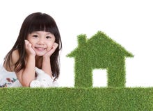 Green grass house with girl