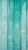 Green grunge wooden wall. Natural green stripes pattern texture for background. Vertical emerald boards of a table, fence royalty free stock photography Green grunge wooden wall. Natural green stripes pattern texture for background. Vertical emerald boards of a table, fence royalty free stock photography